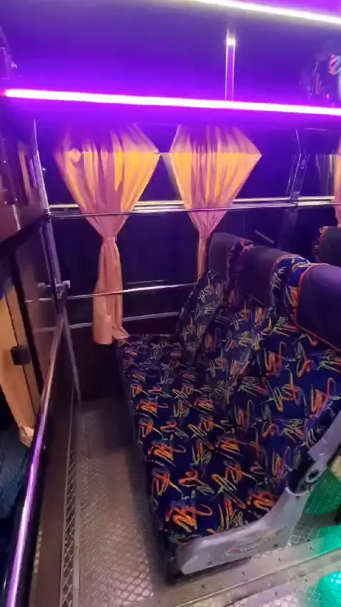 SelectBus 45-seater non-AC bus full interior for group Kokna trips