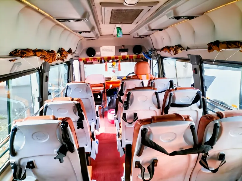 SelectBus Non-AC Tempo Traveller cabin interior for sightseeing Kokna trip